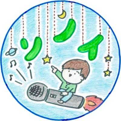 Clifford, a reddish-brown pitbull, posing on a couch and looking stoically at the camera